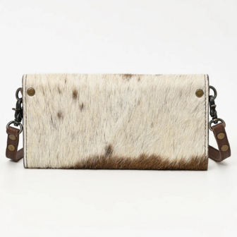 Tas Houston achter br