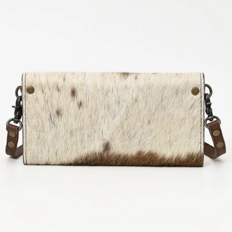 Tas Houston achter br